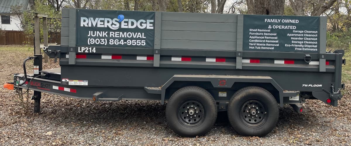 Rivers Edge Junk Removal branded trailer